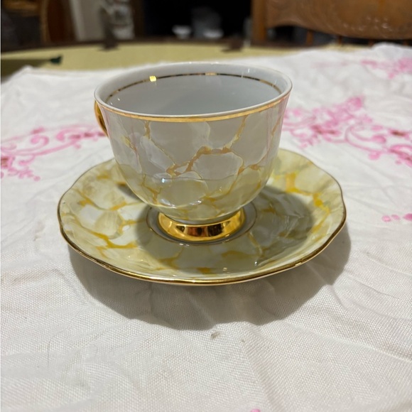 Vintage Gold and White Teacup and Saucer Set with Luxurious Design - Picture 3 of 10